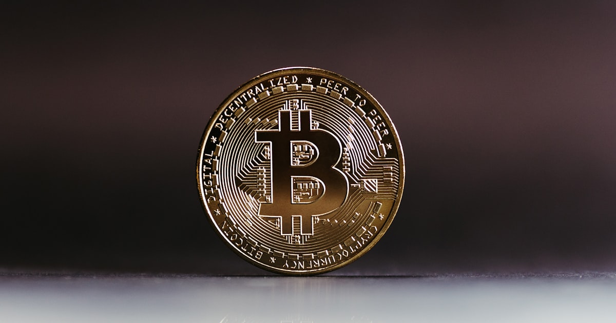 a bit coin sitting on top of a table