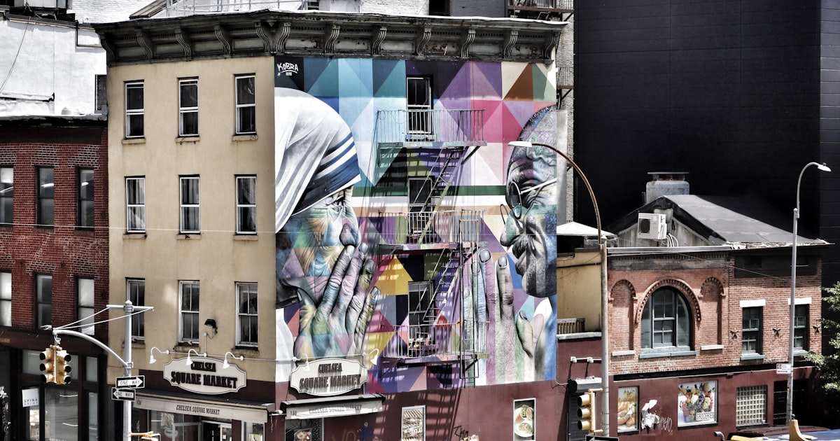 a city street with a mural