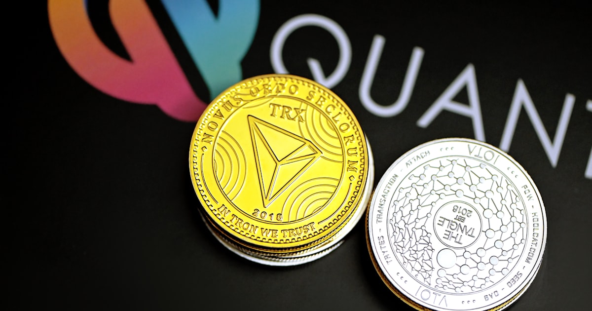 a close up of two different colored coins