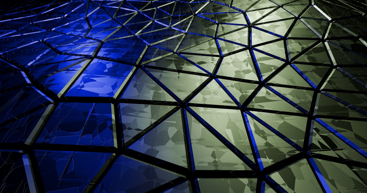 A close up of a building with a blue light