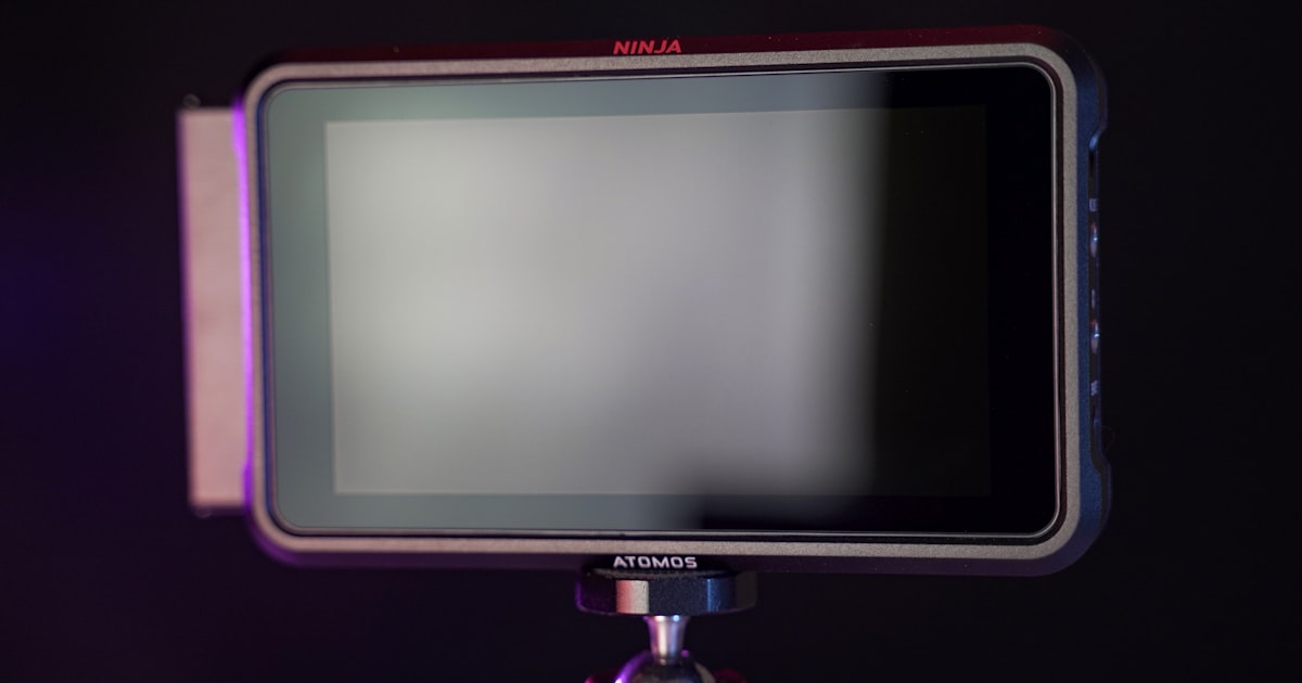 a close up of a camera on a tripod