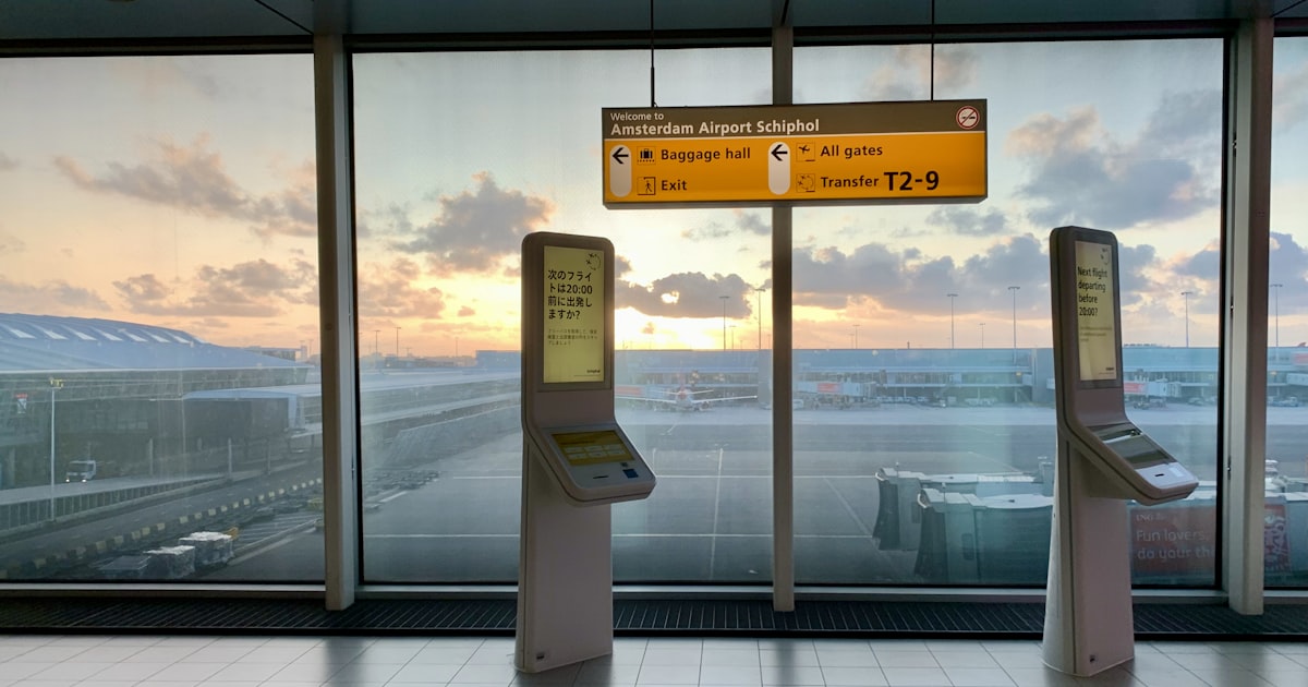 a couple of machines sitting in front of a window