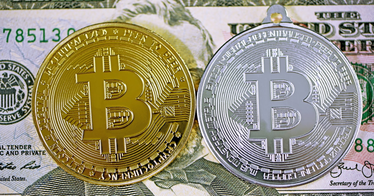 gold and silver round coin