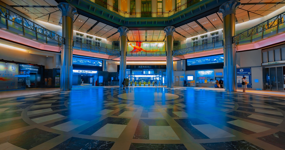 a large indoor mall with a large glass floor