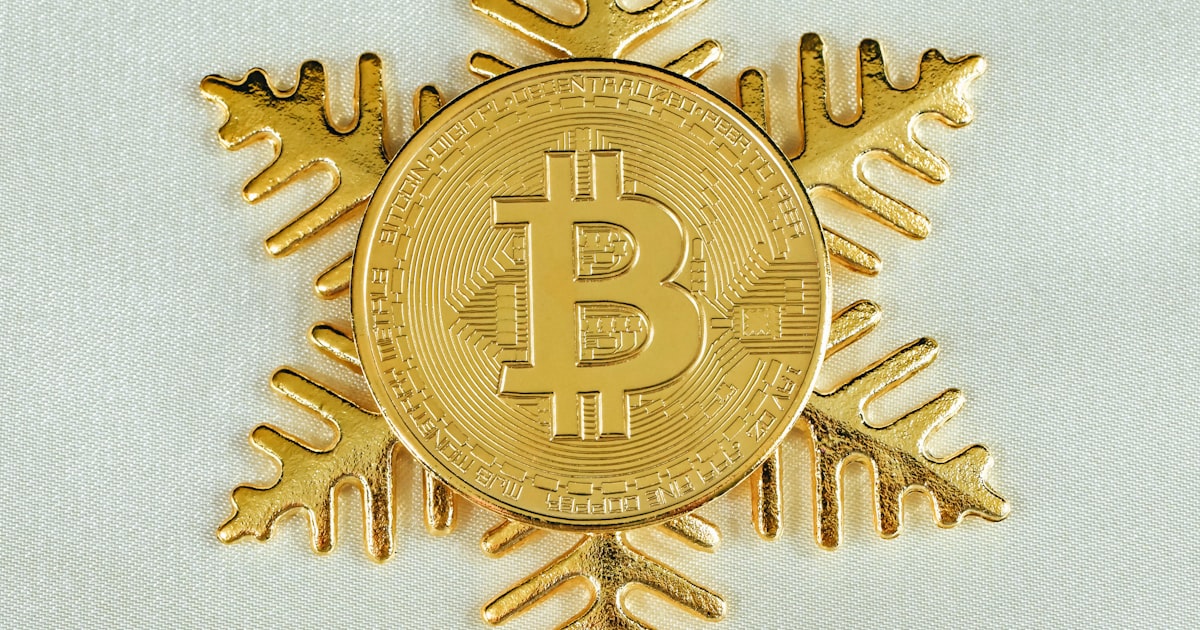 a bitcoin snowflake with a bitcoin on it