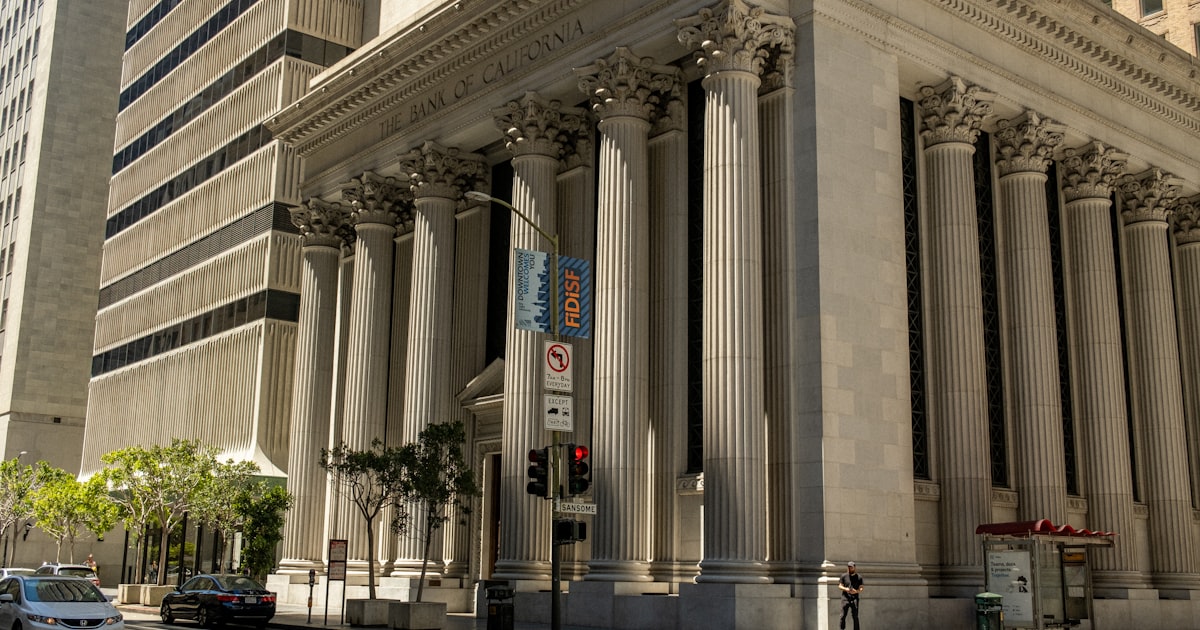 a building with columns and a street