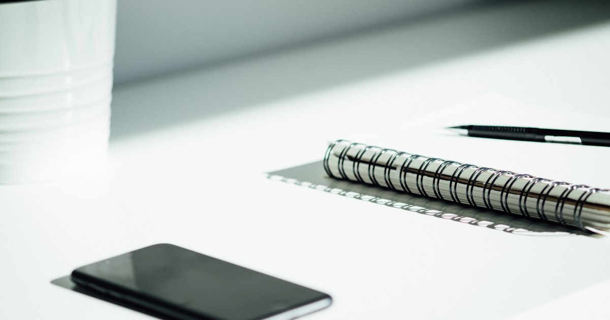 black spiral notebook