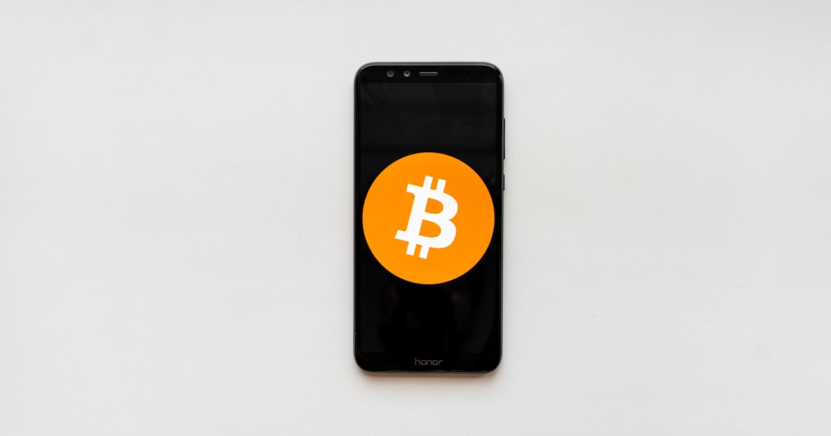 black android smartphone on white table