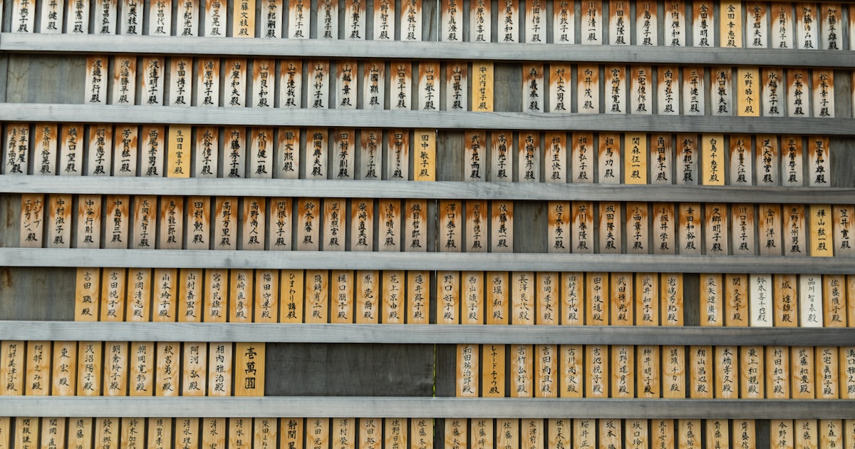 a large metal shelf filled with lots of yellow boxes
