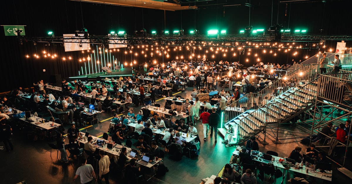 A large room filled with lots of tables and chairs