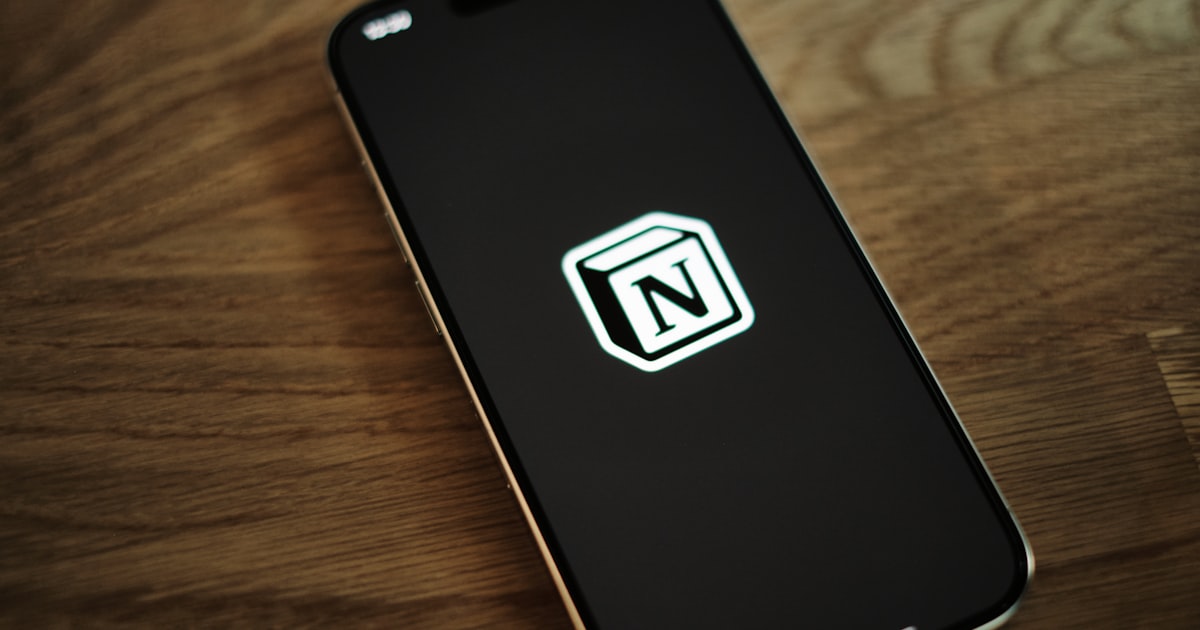 A cell phone with a n logo on it