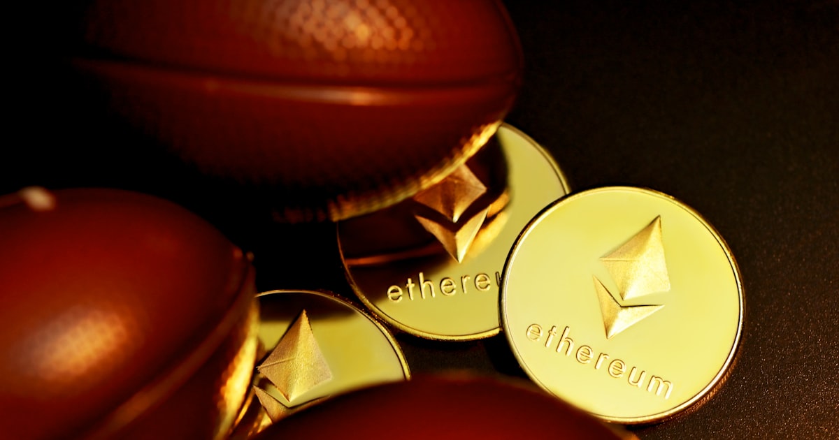 a close up of a pile of gold coins