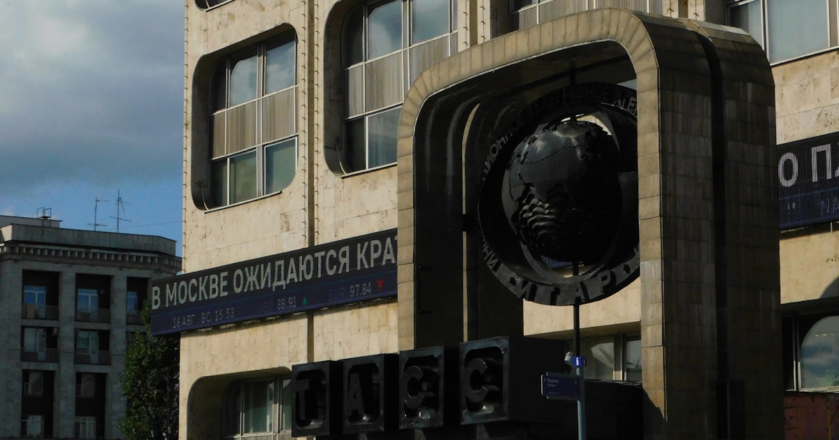 Modern building with abstract sculpture in front