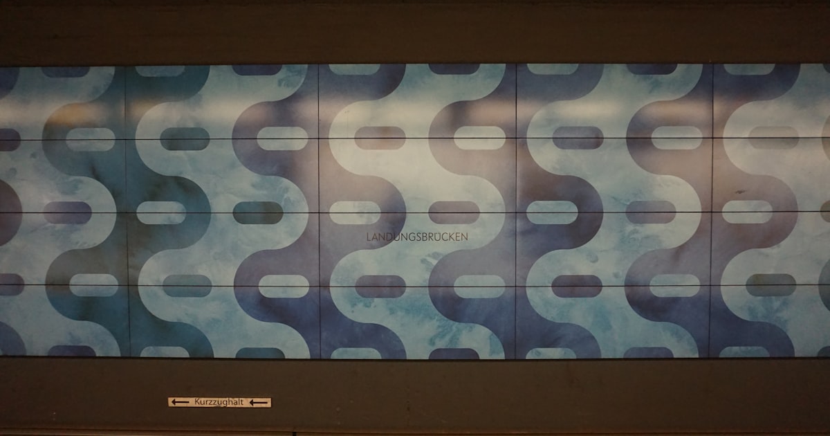 a large blue and white wall with a pattern on it