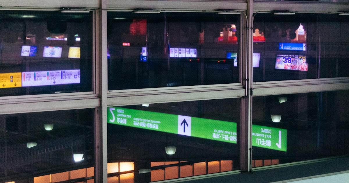 a window with a bunch of signs in it