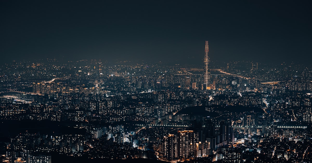 city skyline during night time