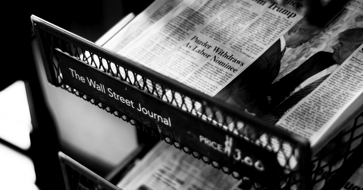 newspapers on The Wall Street Journal rack