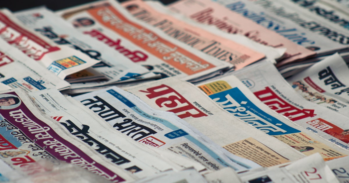 macro photography of assorted newspaper