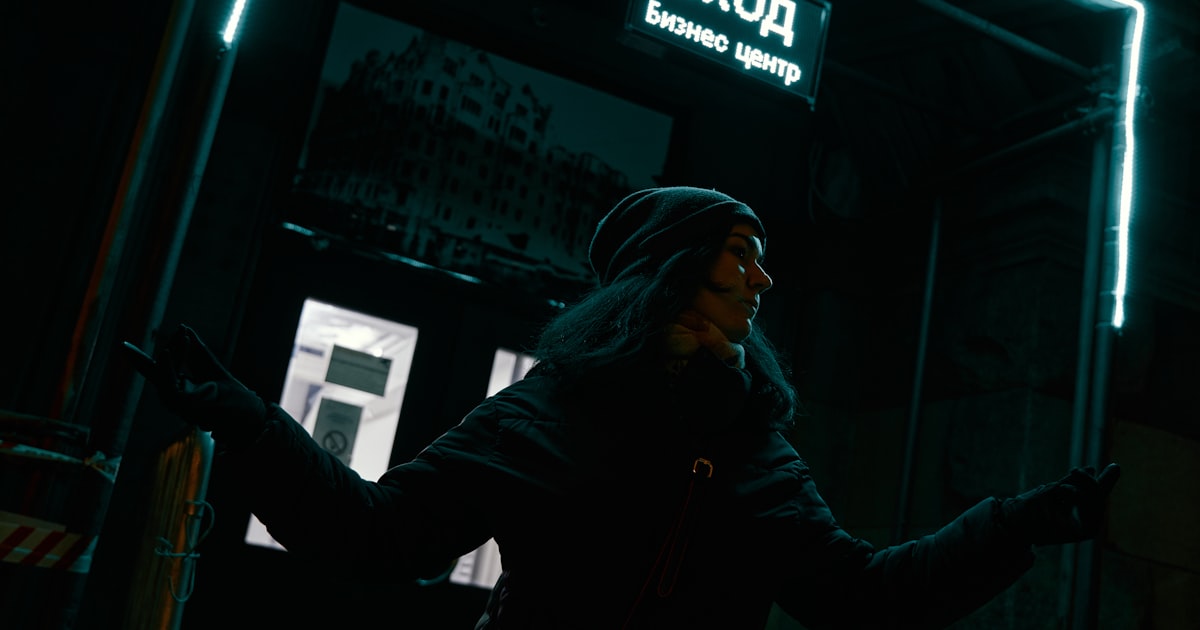 a man wearing a mask and holding a gun
