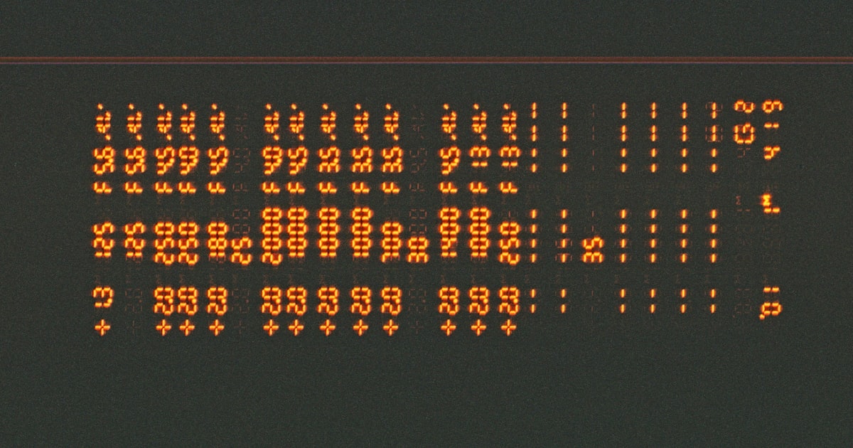 a close up of a sign with numbers on it