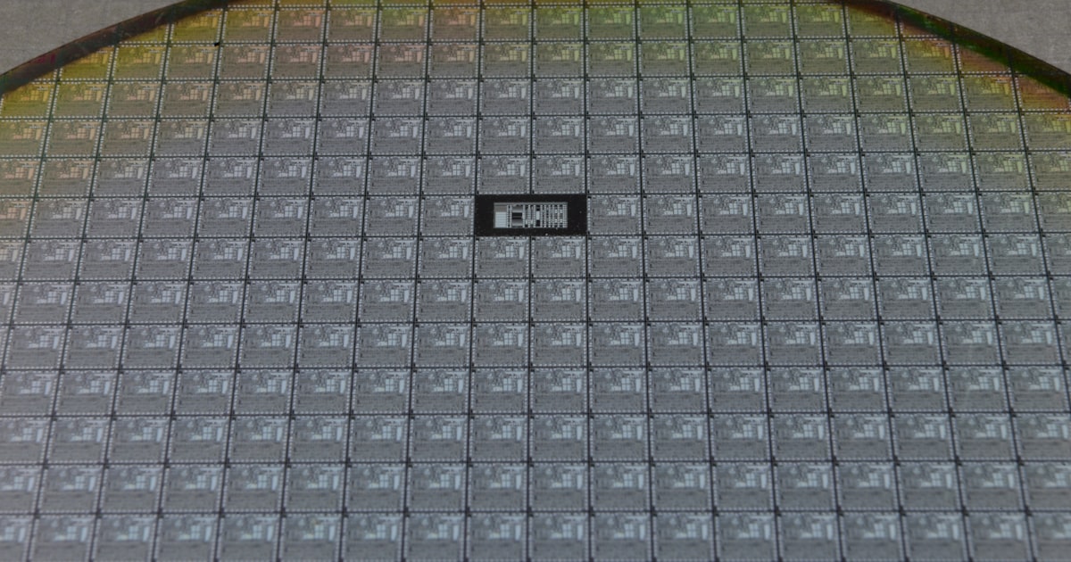 a close up of a metal plate with squares on it