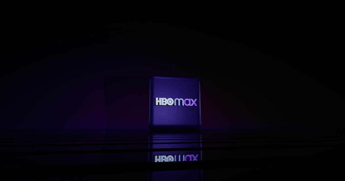 The hbo max logo on a dark background.