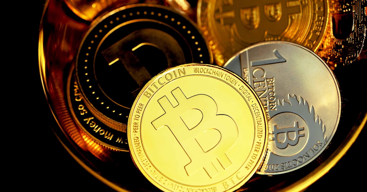 a bunch of bitcoins sitting on top of each other