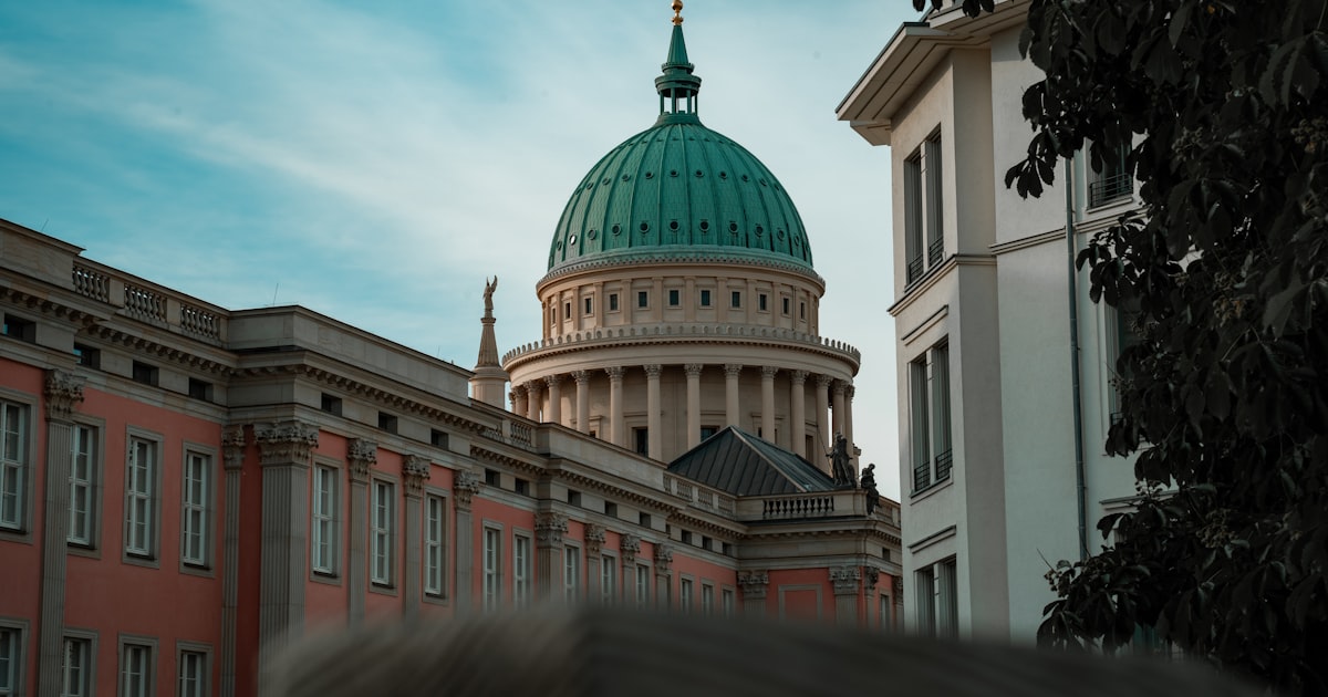 white and green dome building