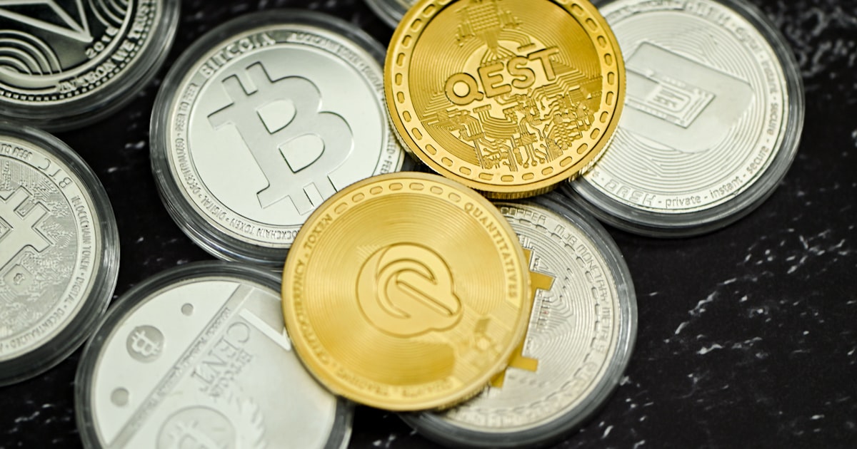 a pile of coins sitting on top of a table