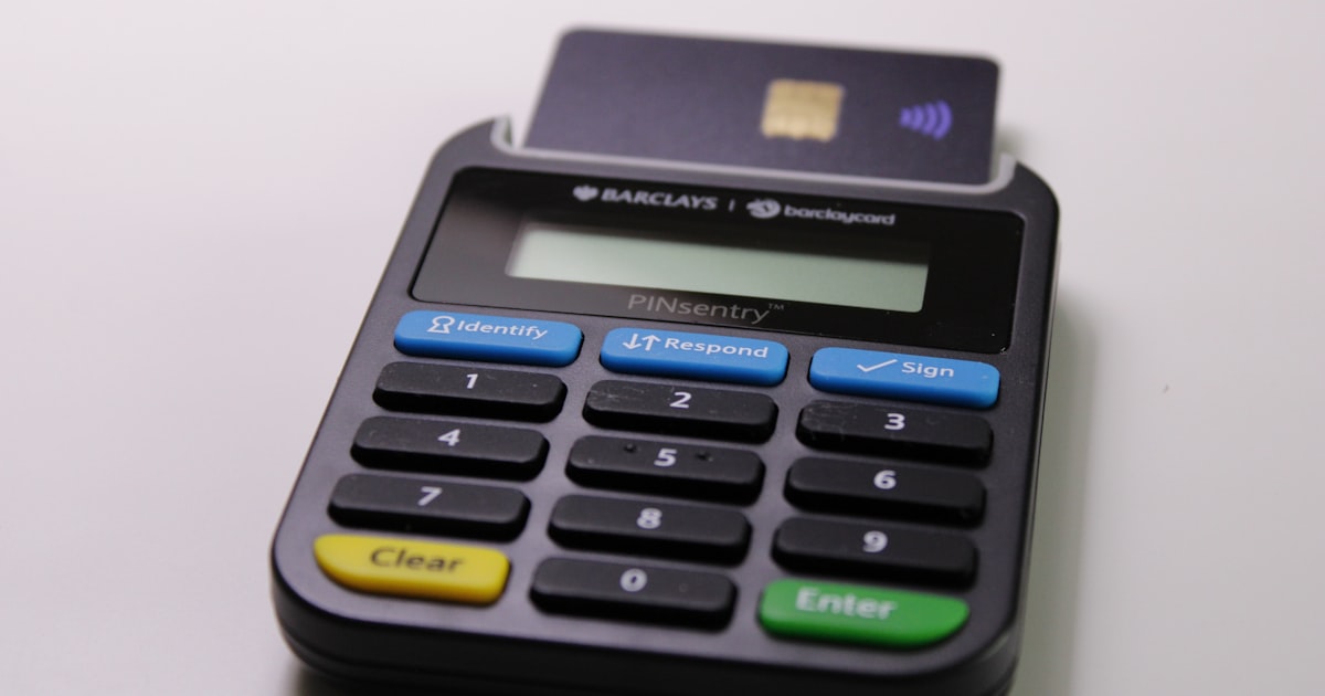 black and blue calculator on white table