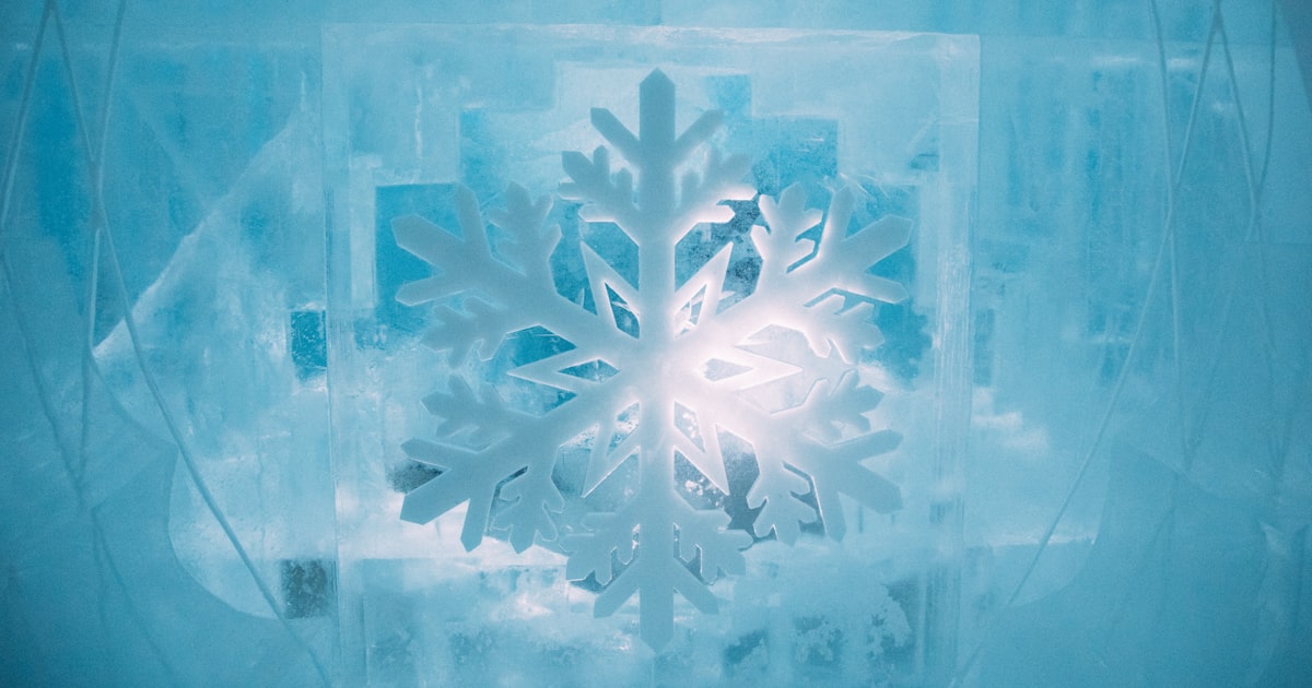 Close-up of a snowflake carved into ice