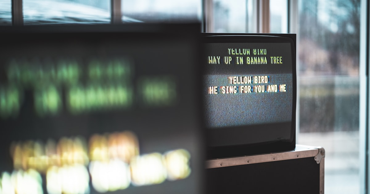 selective photo of flat screen monitor displaying text