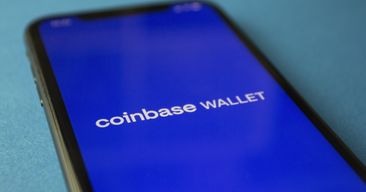 black android smartphone displaying 12 00