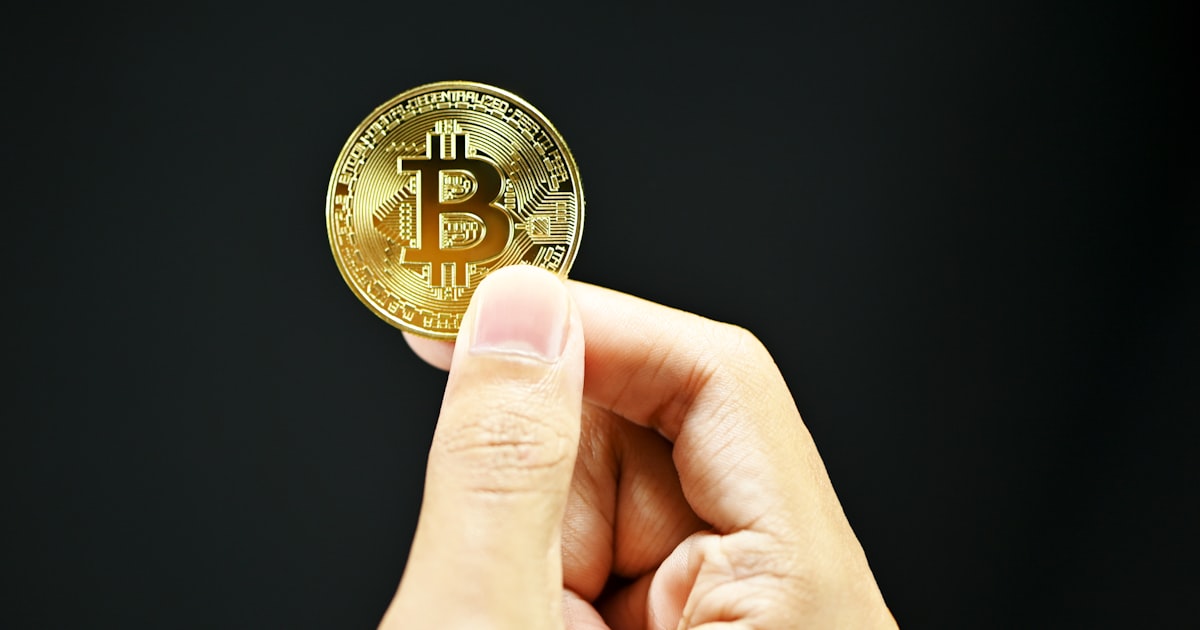 gold and black round coin