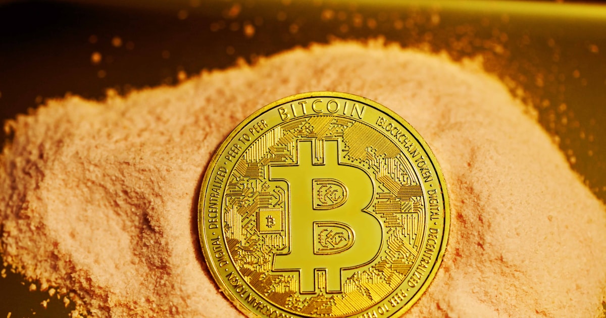 gold and silver round coin