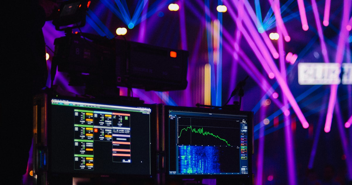 two flat screen monitors in disco room