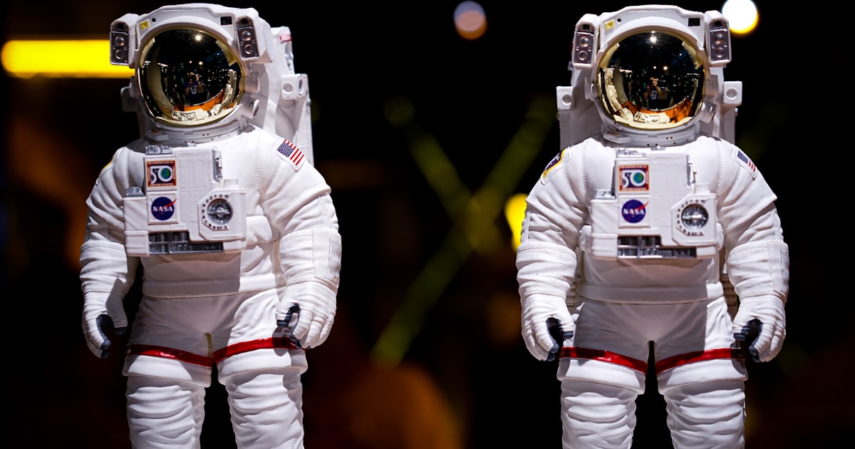 two people in space suits