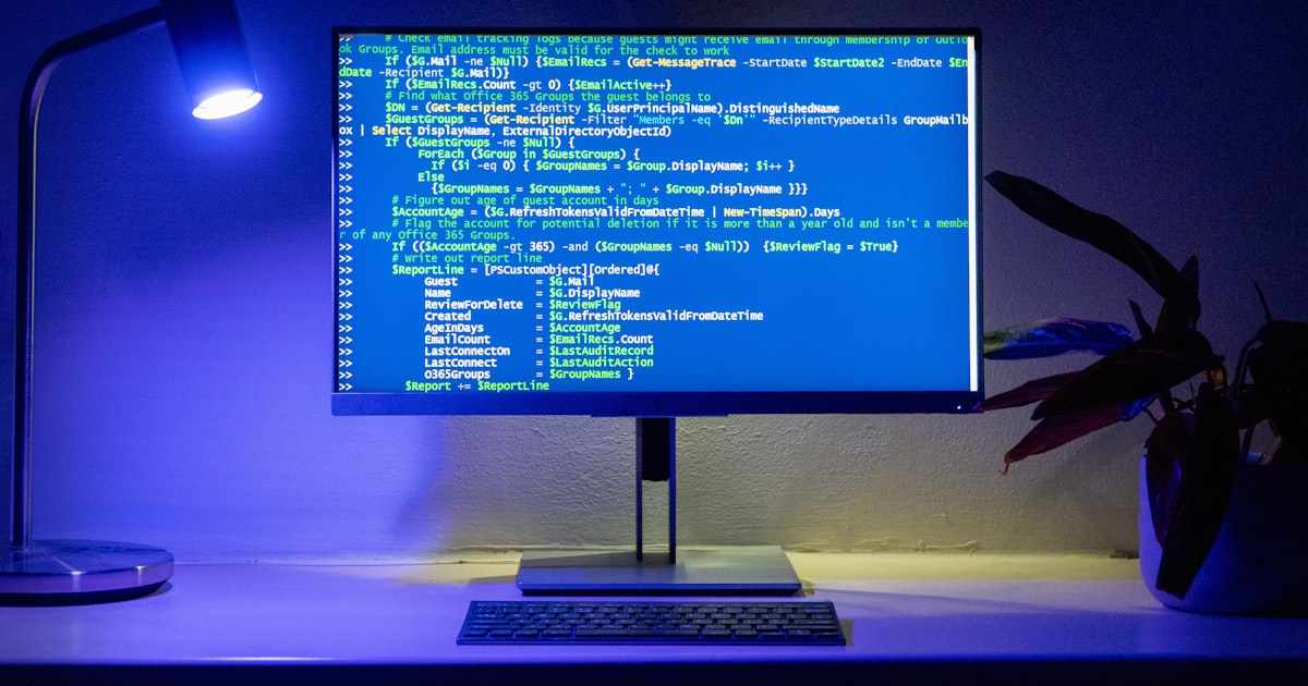 Code is displayed on a computer monitor.