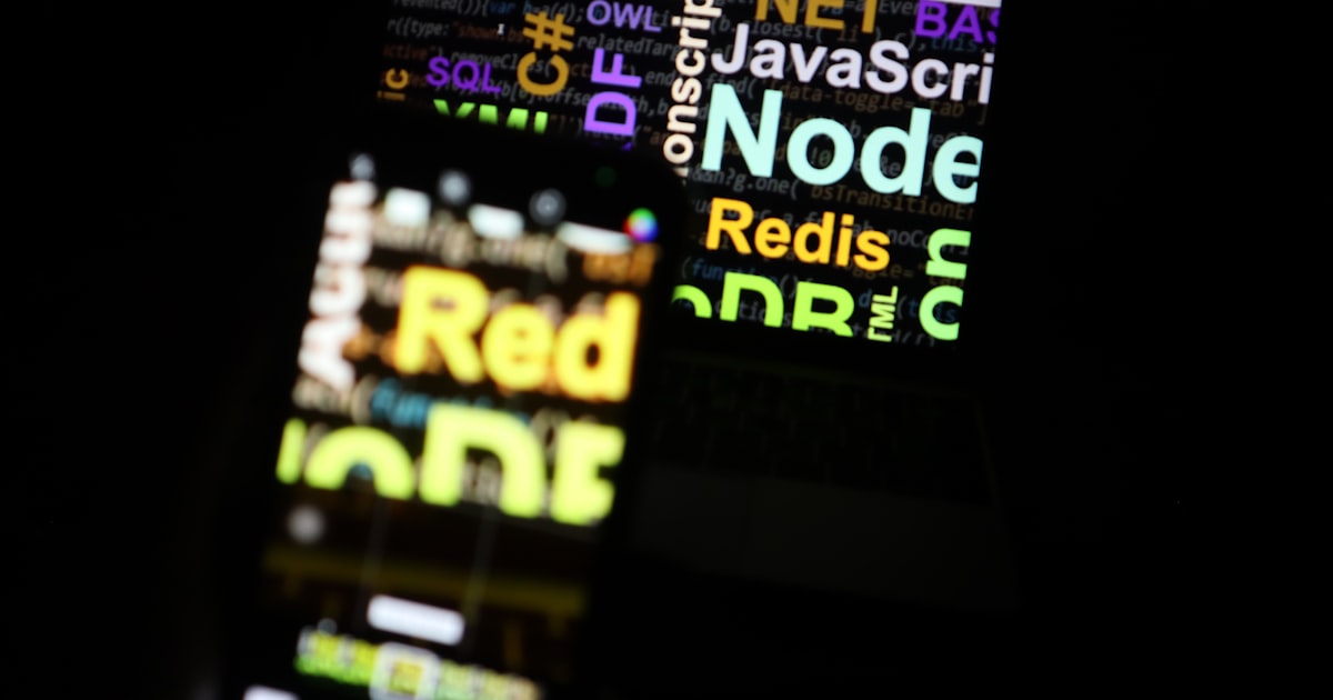 a close up of a cell phone in the dark