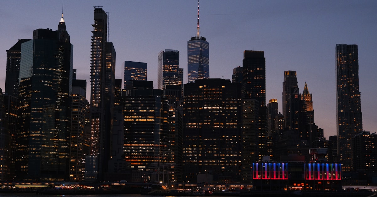 a city skyline with a lot of tall buildings