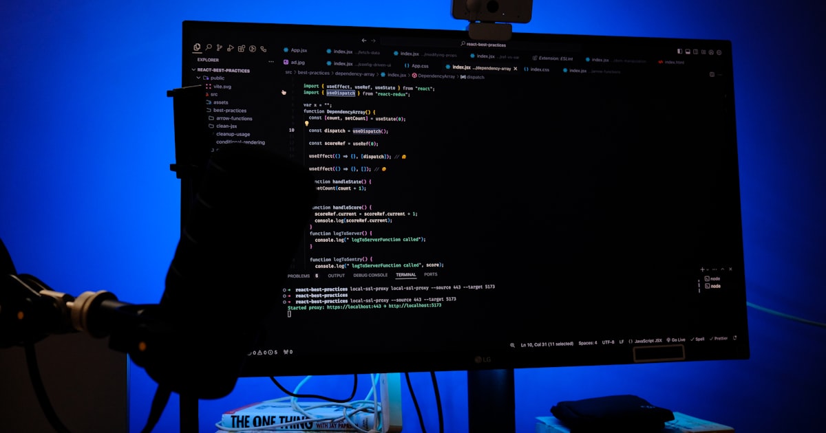 A computer monitor sitting on top of a desk