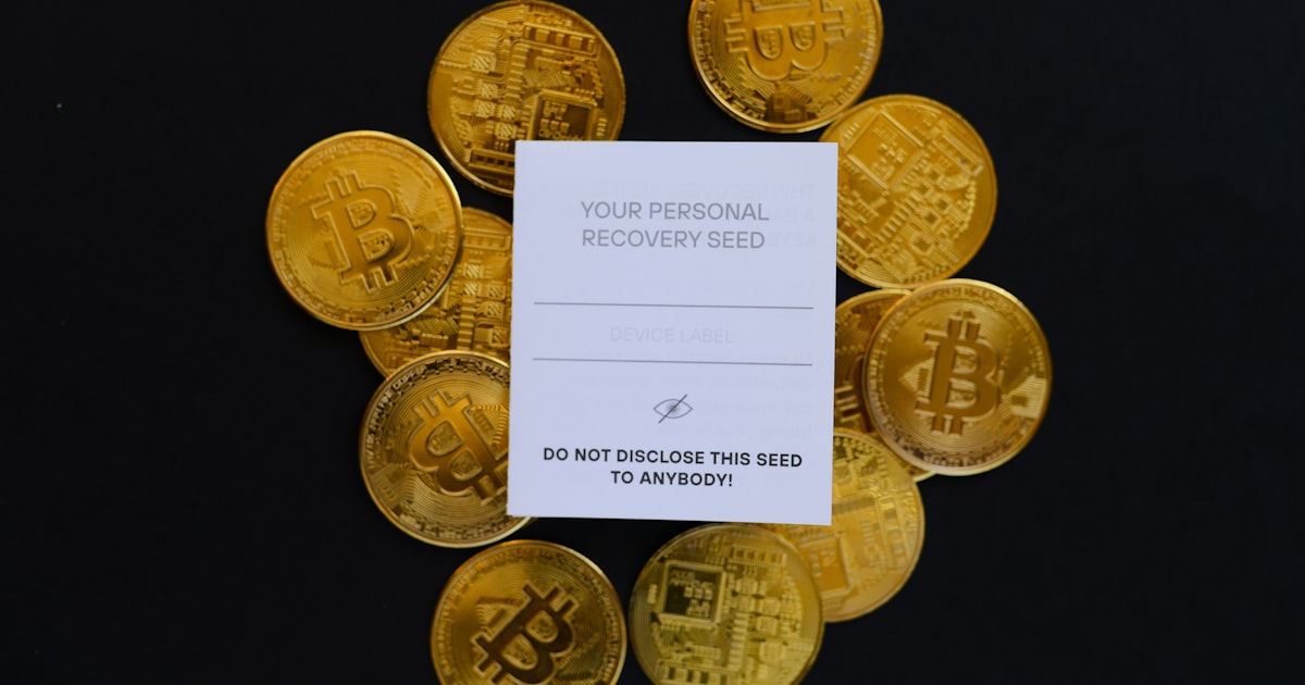 a pile of gold bitcoins sitting on top of a table