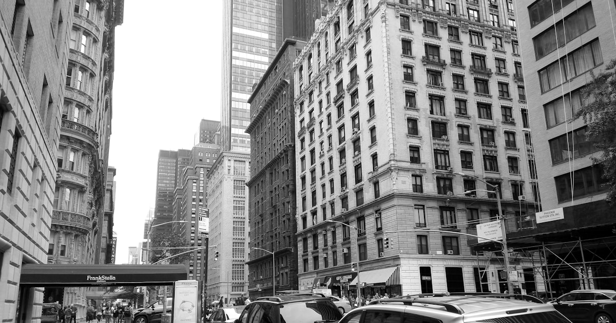 a city street filled with lots of tall buildings