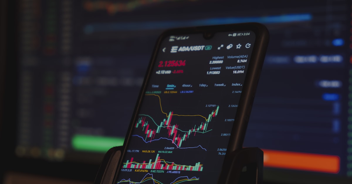 black android smartphone on brown wooden table