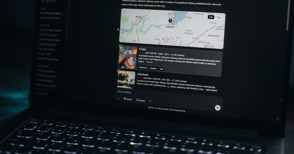 Laptop screen shows a map and related information.