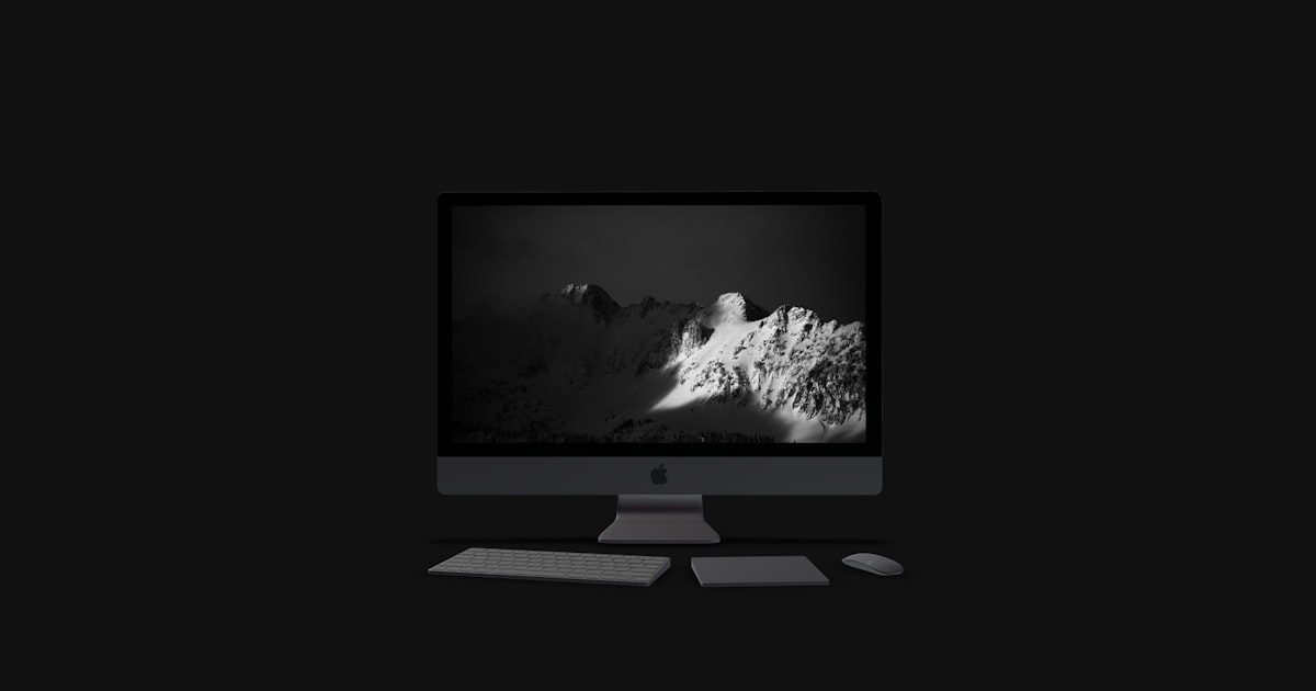 a computer monitor sitting on top of a desk