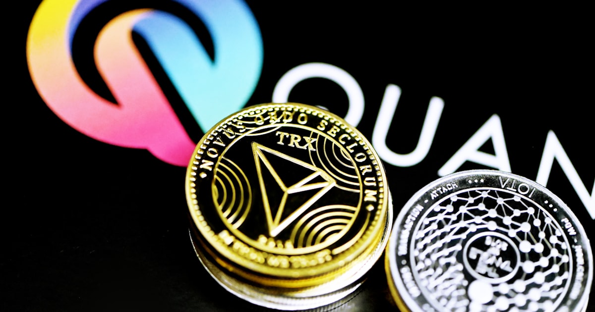 a close up of two coins on a table
