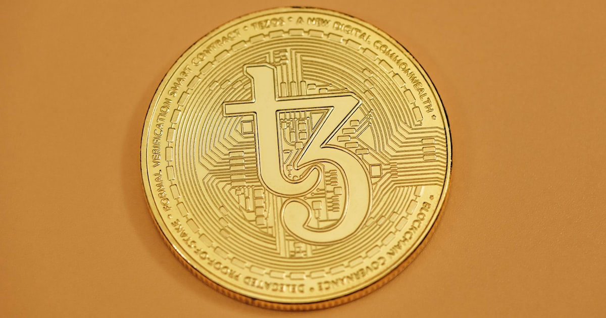 a close up of a coin on a table