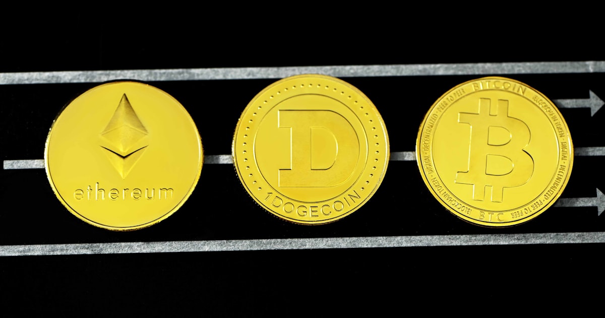 two gold and silver round coins