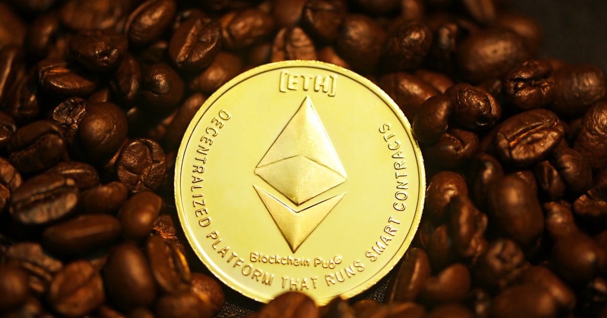 brown coffee beans with white and gold round coin